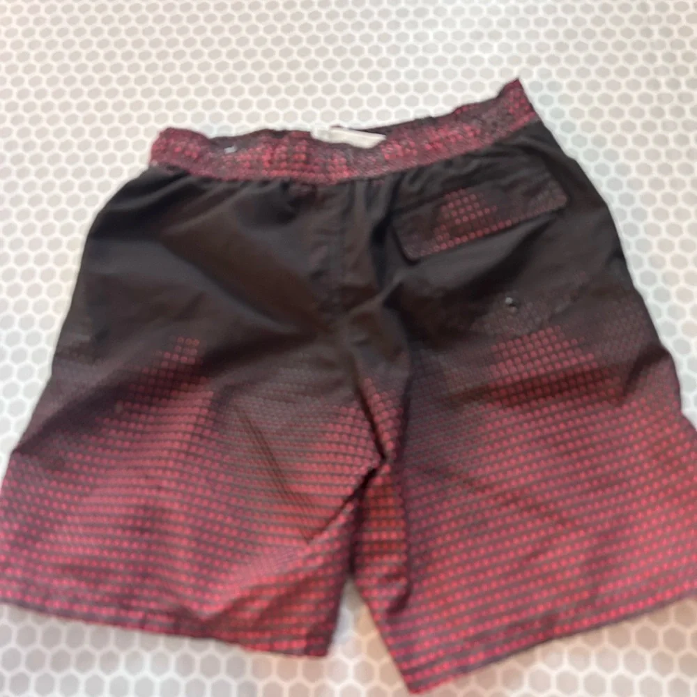 Youth Body Glove Black and Red Gradient Swim Board Shorts.         Size S (8)